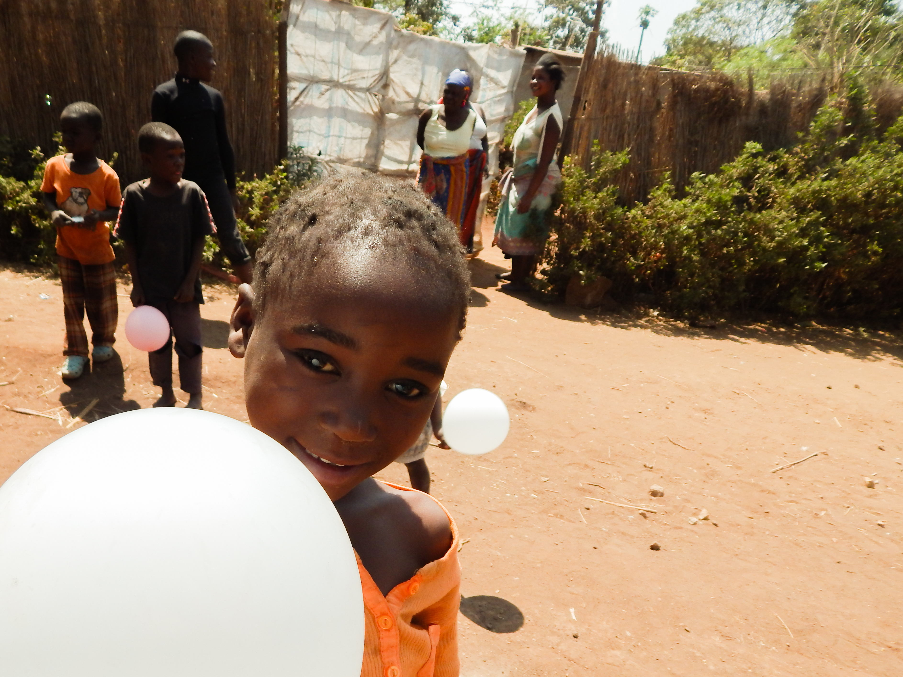 Volunteers bring balloons for children to play with during one of their breaks.