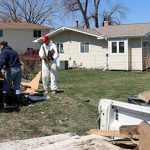 Disaster response volunteers from Habitat Omaha and Team Rubicon